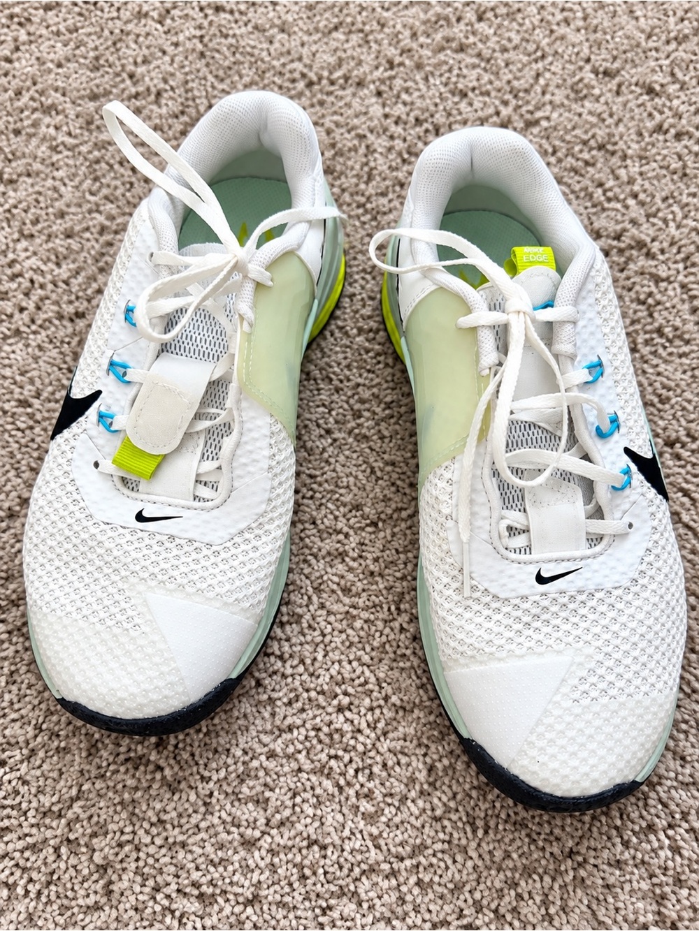 Nike women’s White Sneakers with Green and Black Accents